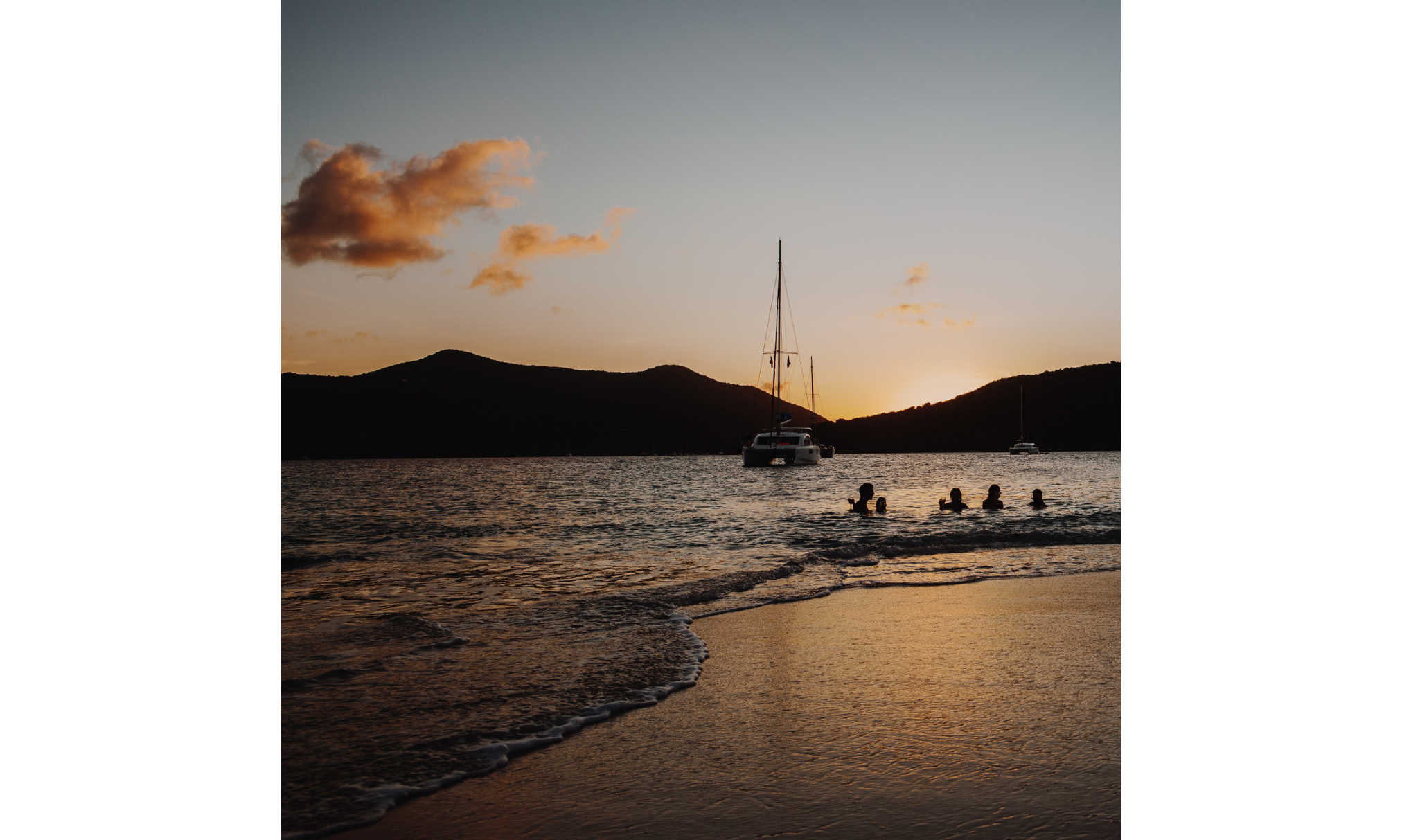 Catamaran anchored at sunset during a sailing vacation in the British Virgin Islands